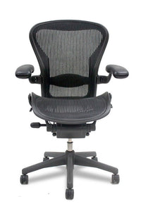 Herman Miller Aeron in Carbon - office chair - black mesh - front view - modern office furniture - classic design - iconic office chair - chicagoofficechair.com